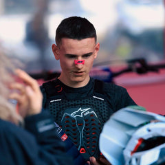 Motocross Racer wearing a Joov Nasal Strip, protective racing kit at motocross championship